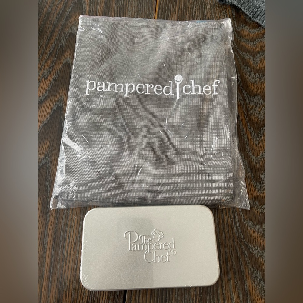 Pampered chef bundle. Apron brand new and cookie cutters set